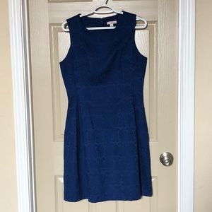 Eva Mendas royal blue dress with brocade pattern.